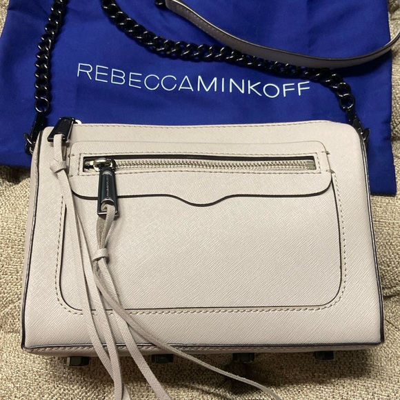 Sale! Rebecca Minkoff light gray crossbody bag with chain strap and tassels. - Picture 1 of 16